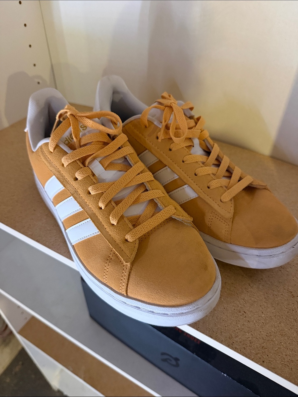 adidas Suede Low-Top Sneakers in Orange with White Stripes